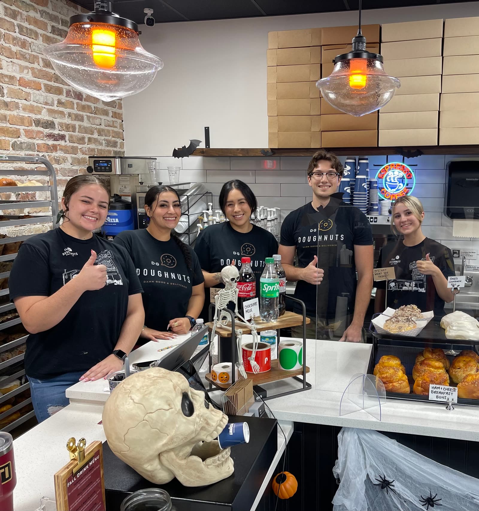 The Damn Good crew working behind the counter